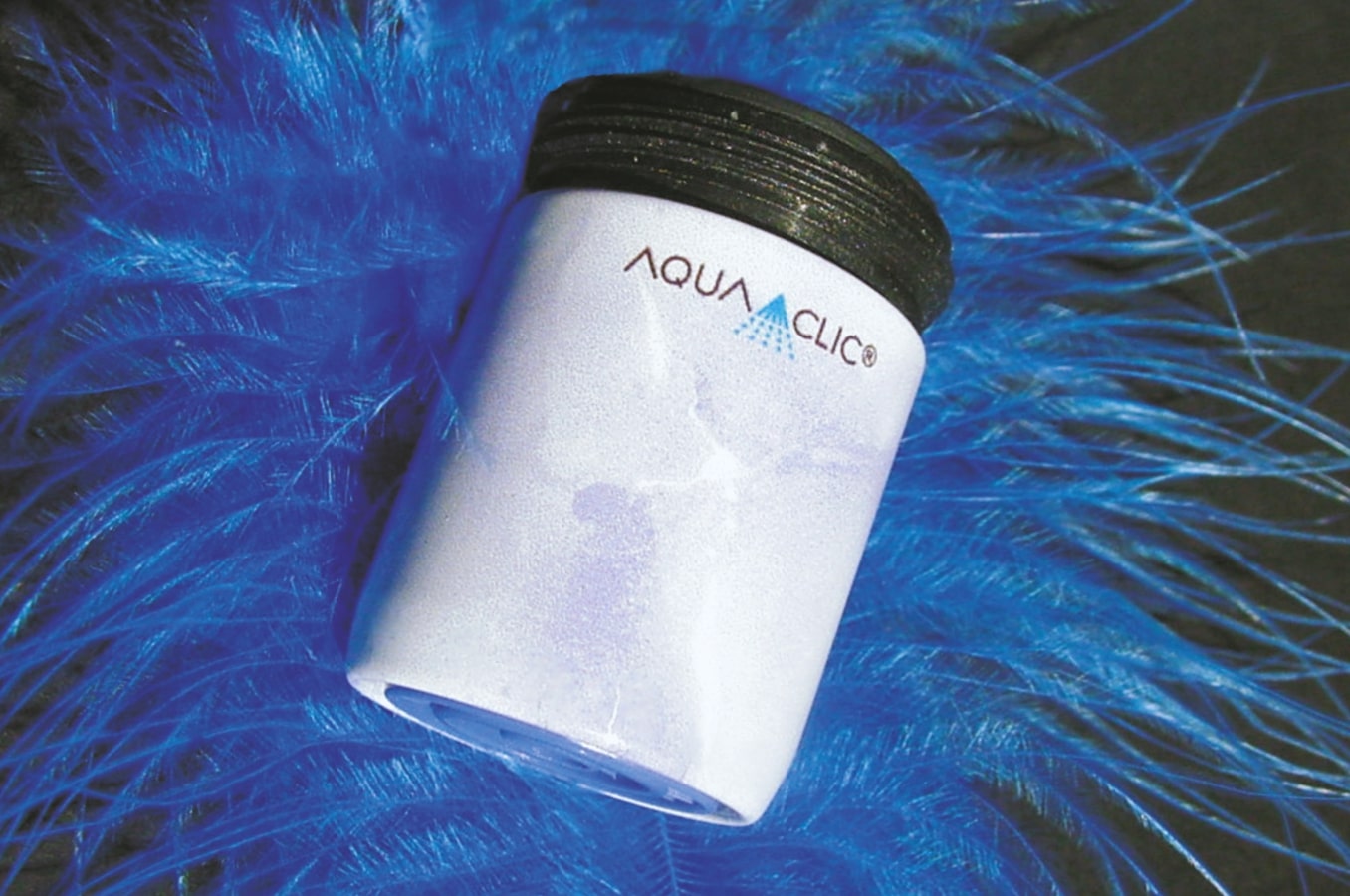 AquaClic-Strahlformer am Stone-Design-Wasserhahn: spart Wasser, Energie und Kosten