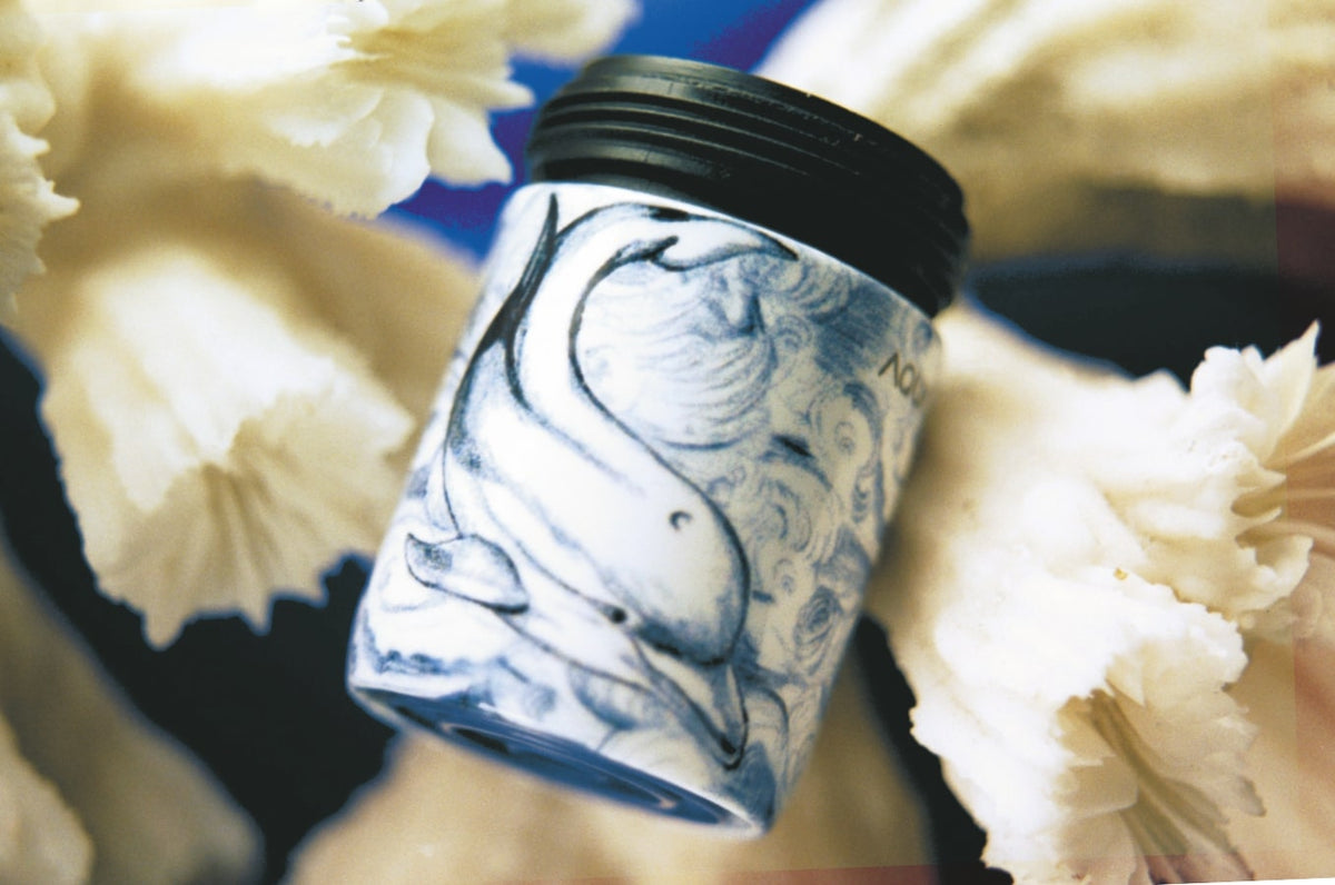 AquaClic-Durchflussmengenregler am Smiling dolphin-Design-Wasserhahn: reduziert den Wasserverbrauch und spart Geld und Energie