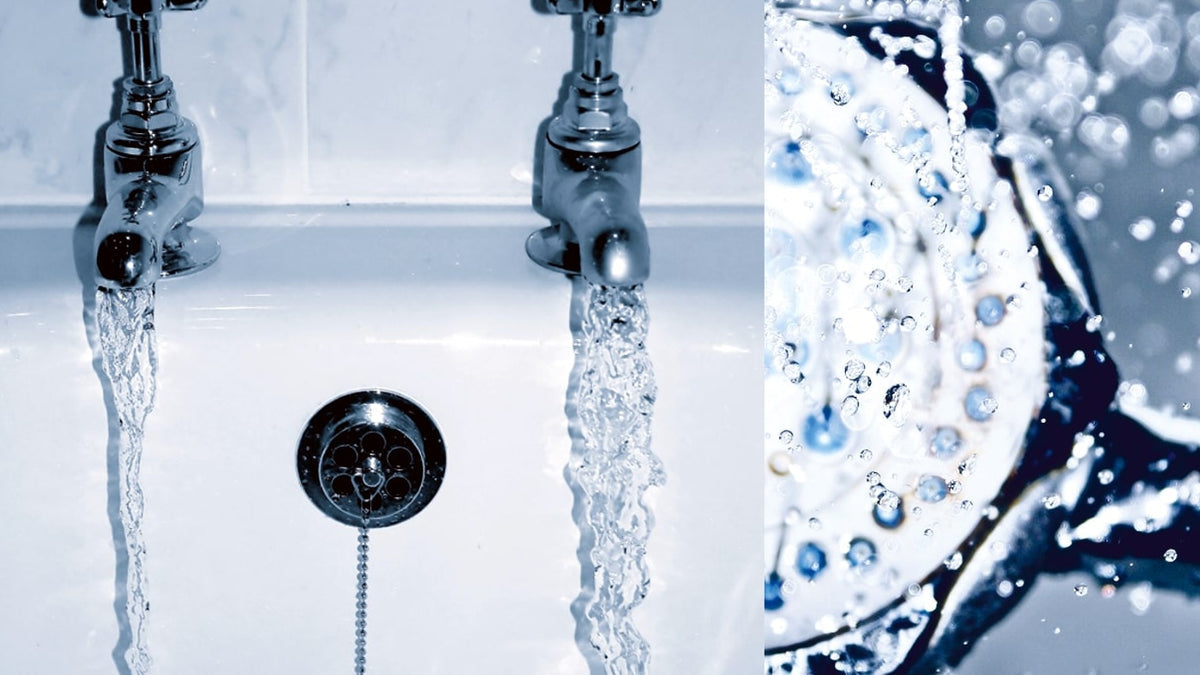 Zwei Wasserhähne und eine Dusche als Symbol fürs Spülen von Leitungen